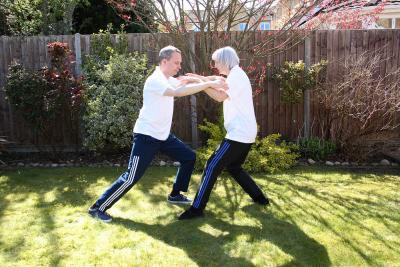 Gary and Janet playing Opening Form in Tau Sau